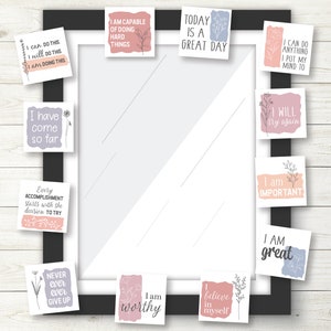 May include: A set of 12 motivational affirmation cards with floral illustrations and positive messages. The cards are printed on textured paper with a pink, blue, and gray color scheme. The cards feature phrases such as "I am capable of doing hard things", "Today is a great day", "I will try again", and "I am worthy".