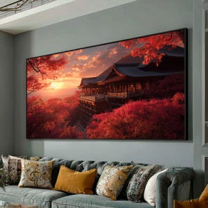 May include: Large framed canvas art print depicting a Japanese temple nestled among vibrant red autumn foliage. The artwork features a sunset with warm orange and red hues, creating a serene and picturesque landscape scene.