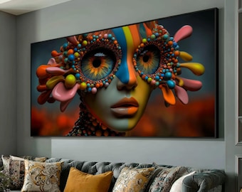 May include: A large framed art print featuring a surreal portrait of a face with vibrant colors. The face is adorned with intricate, colorful details, including a mask-like design around the eyes and a rainbow stripe down the forehead. The artwork is displayed above a gray sofa with decorative pillows.