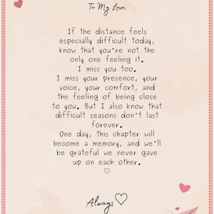 May include: A rectangular card with a light pink background and a dashed border. It features black handwritten text starting with To My Love, followed by a message about distance and longing, ending with Always and a heart icon. Pink hearts decorate the corners.