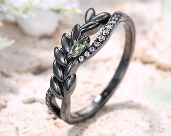 Anillo vintage de peridoto marquesa con forma de rama de trigo: banda natural de oro negro con diseño de hoja.