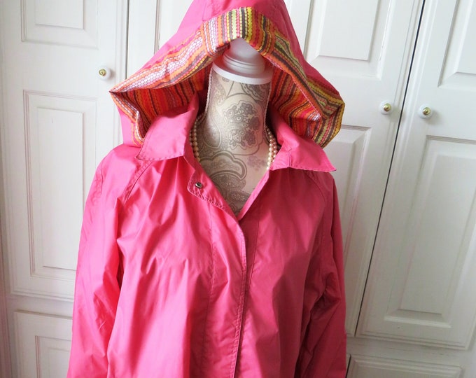 1980s Womens Pink Hooded Raincoat by Totes Size XL Mid Length Nylon