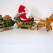 Musical Santas Sleigh by Maisto  Red Flocked Felt Reindeer image 0