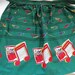 1960s Christmas Holiday Apron  Musical Instruments  Carolers image 0