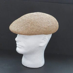 May include: A set of three ceramic mugs with a speckled, matte finish. The mugs are in shades of cream, light gray, and dark gray. Each mug has a simple, minimalist design, perfect for coffee or tea.