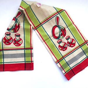 May include: A red, green, and white checkered kitchen towel with a design of red and green pots and pitchers.