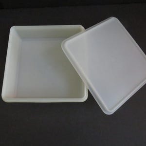 May include: A set of three ceramic mugs with a speckled, matte finish. The mugs are in shades of cream, light gray, and dark gray. Each mug has a simple, minimalist design, perfect for coffee or tea.