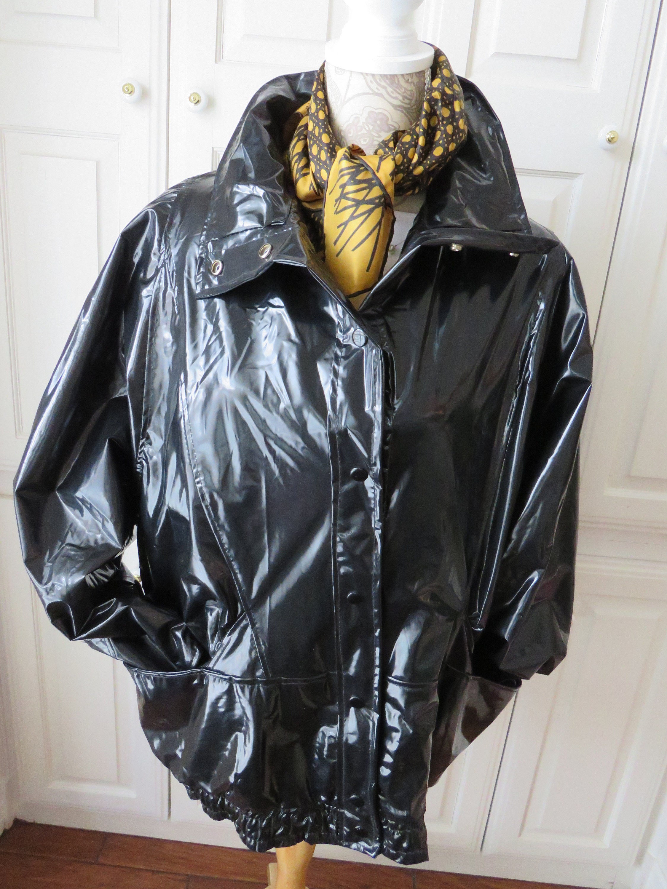 Black top shiny raincoat