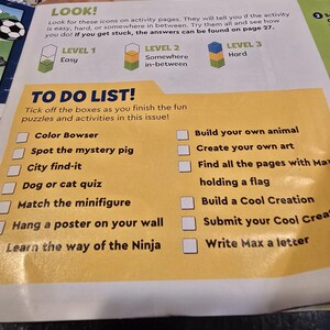 May include: A printed activity page featuring a yellow TO DO LIST section with checkboxes next to tasks like Color Bowser, Spot the mystery pig, City find-it, Dog or cat quiz, Match the minifigure, Hang a poster, and Learn the way of the Ninja.