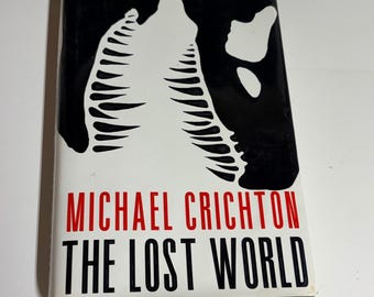El mundo perdido, Michael Crichton, 1995, primera edición comercial, tapa dura, ilustraciones de Chip Kidd.