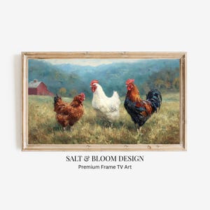 Könnte beinhalten: Gerahmtes Kunstwerk mit drei Hühnern auf einem Feld mit einer roten Scheune im Hintergrund. Die Hühner sind braun, weiß und rot und schwarz. Das Kunstwerk trägt die Aufschrift "SALT & BLOOM DESIGN Premium Frame TV Art."