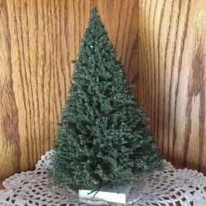Miniature trees are made in the USA at MrTrain.com.