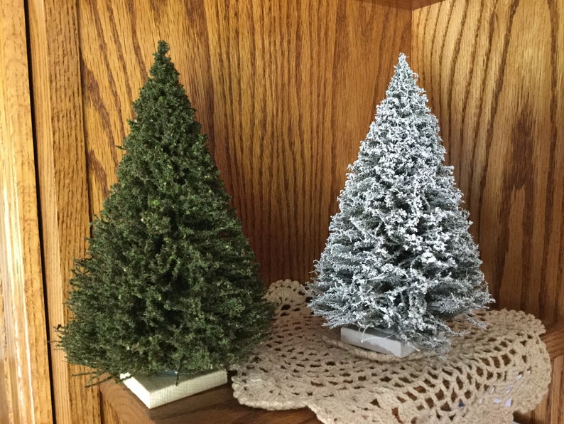 Miniature trees. 7 inches tall. Extra full on the bottom. Made in the USA at MrTrain.com.