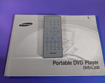 Reproductor de DVD portátil Samsung DVD-L200, control remoto 01053F y manual de instrucciones, color plata.
