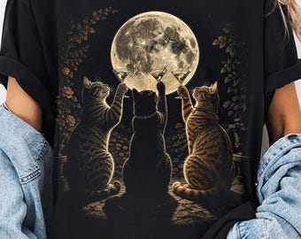 Three Cats Toasting Under Full Moon | Funny Martini Cat Art | Vintage Dark Fantasy Garden Scene | Aesthetic Cat Lover Shirt Design