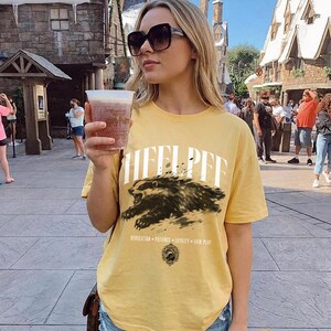 Wizard House Shirt, Fantasy House Aesthetic Shirt, Magic School Inspired Unisex T-Shirt, Universal Vacation shirt Mustard