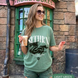 Wizard House Shirt, Fantasy House Aesthetic Shirt, Magic School Inspired Unisex T-Shirt, Universal Vacation shirt Light Green