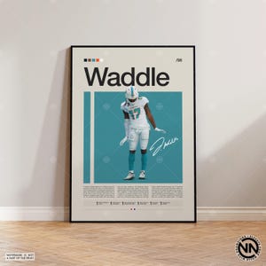 May include: Poster featuring the name "Waddle" in large text, with a photo of a football player in a white and teal uniform. The poster includes the number 17, a signature, and text at the bottom. The background is a light beige with teal accents.