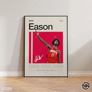 Könnte beinhalten: Gerahmtes Poster mit einem Basketballspieler in einem roten Rockets-Trikot mit der Nummer 17. Das Poster trägt den Namen "Eason" in großen schwarzen Buchstaben, eine Unterschrift und einen roten Hintergrund. Das Poster wird auf einem Holzboden präsentiert.