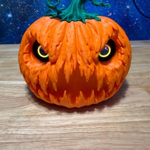 3D scary animated eyes pumpkin