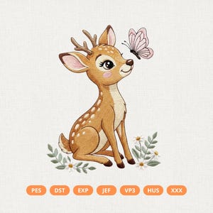 May include: An embroidered design featuring a cartoon deer with brown fur and white spots, sitting among small white flowers and green leaves. A pink butterfly hovers near the deer's face. The design is on a white background.