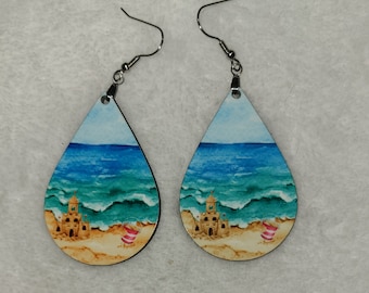 Sand castle by the sea on Teardrop Earrings