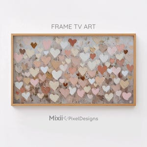 May include: A rectangular framed artwork featuring a textured background with numerous heart shapes in shades of white, pink, and brown. The words "FRAME TV ART" are at the top. The artwork is in a light brown wooden frame.