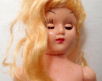 doll with messy hair