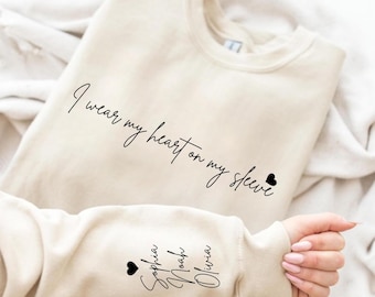 I Wear My Heart On My Sleeve Sweatshirt and Hoodie, Gift for Mom, Custom Mama Sweatshirt with Children Name on Sleeve, MothersDay Gift FM36