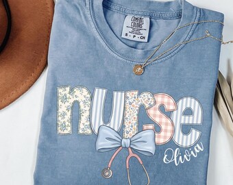 Comfort Colors® Custom Floral Nurse Shirt, Stethoscope Bow Tee, Coquette Nurse Shirt, Nurse Gift Shirt, Nursing School Tee, RN Shirt, GN237