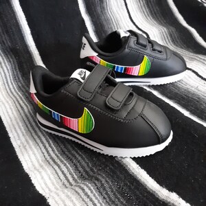 nike cortez animal print