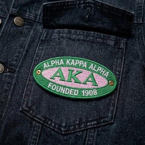 May include: A set of three ceramic mugs with a speckled, matte finish. The mugs are in shades of cream, light gray, and dark gray. Each mug has a simple, minimalist design, perfect for coffee or tea.