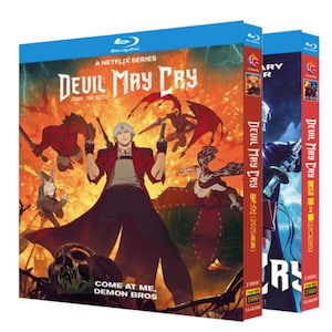 Könnte beinhalten: Zwei Blu-ray-Disc-Hüllen für die Netflix-Serie "Devil May Cry". Die Cover zeigen Anime-Artwork mit Charakteren in dynamischen Posen vor einem feurigen Hintergrund. Der Text "Come at me, Demon Bros" ist sichtbar.