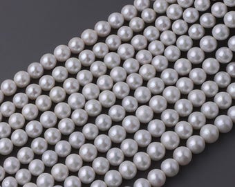 Perle d'acqua dolce naturali rotonde ad alta lucentezza da 10-11 mm per gioielli e accessori, una collana lunga circa 40 cm