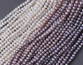 Collana con perle d'acqua dolce naturali quasi rotonde da 5-6 mm, un filo lungo circa 35 cm