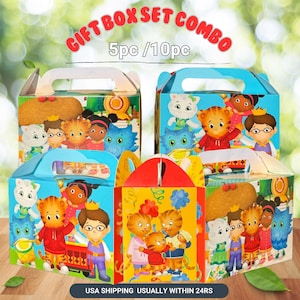 May include: Gift box set combo with colorful illustrations of cartoon characters. The boxes have handles and are in various colors, including blue, yellow, and red. Text on the boxes reads "GIFT BOX SET COMBO" and "5pc / 10pc".