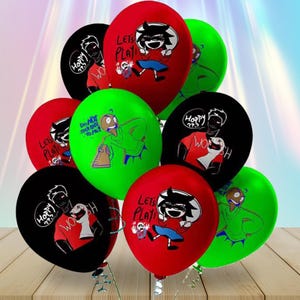 May include: A collection of red, green, and black balloons. Each balloon features a cartoon character and text, including "LET'S PLAY", "Happy", and "WORSH". The balloons are arranged on a wooden surface.