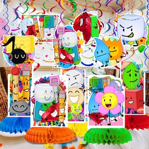 May include: A collection of colorful cartoon character cutouts, including pencils, erasers, and various animated objects. The image features a festive arrangement with decorative paper honeycomb balls and swirling ribbons, creating a playful and celebratory atmosphere.