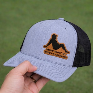 May include: A rustic wooden sign with the text "Welcome to our home" in a handwritten style. The sign features a distressed finish and a simple, inviting design, perfect for a front porch or entryway.