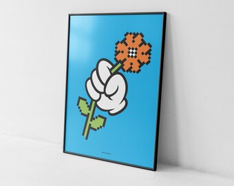 May include: A framed art print featuring a pixelated cartoon hand in a white glove holding a flower with an orange blossom and a checkered center. The background is a solid light blue color.