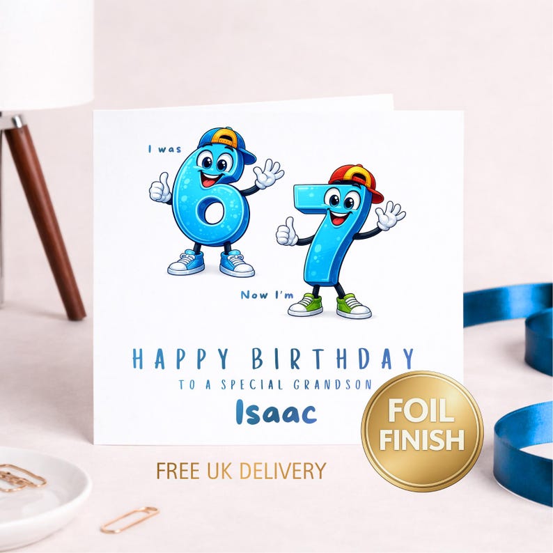 May include: A square birthday greeting card featuring cartoon number characters 6 and 7 wearing baseball caps and sneakers. The text reads I was 6, Now I'm 7, HAPPY BIRTHDAY TO A SPECIAL GRANDSON, and the name Isaac in blue font.