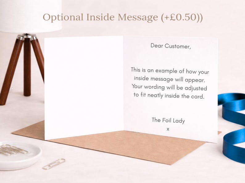 May include: A white greeting card open to display printed text that reads: Dear Customer, This is an example of how your inside message will appear. Your wording will be adjusted to fit neatly inside the card. The Foil Lady x.