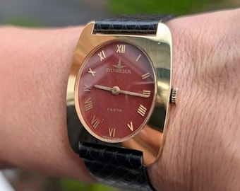 Impresionante reloj de hombre con esfera ovalada, estilo vintage, nuevo, sin usar.