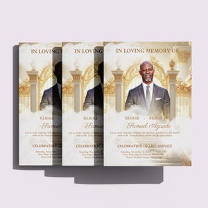 May include: A stack of memorial cards with a portrait of a man in a suit, framed by ornate gold architectural elements. The cards read "In Loving Memory of Samuel Aguado" with dates and details for a Celebration of Life Service.