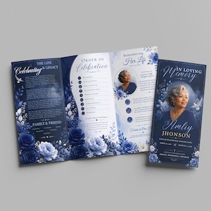 May include: A tri-fold funeral programme featuring deep blue and white floral accents. The cover displays a portrait of a woman with the text In Loving Memory, Amliy Jhonson, and dates. The interior panels include sections for The Life & Legacy and Order of Celebration.