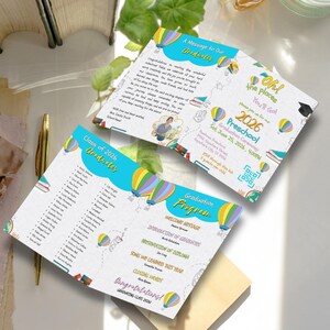 May include: A folded 2026 preschool graduation program and invitation card featuring colorful hot air balloon illustrations, blue accents, and text including 'Oh! The Places You'll Go!', 'Graduation Program', and a list of student names.