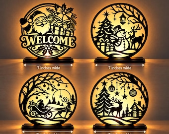 Paquete de archivos de corte láser navideños, siluetas redondas de Papá Noel, trineo, muñeco de nieve y renos en escena invernal, letrero de bienvenida para decoración de mesa SVG DXF AI
