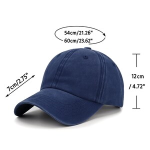 May include: A solid navy blue baseball cap with a curved brim and stitched panels. Dimensions are labeled as 54cm to 60cm (21.26 to 23.62 inches) for the head circumference, a 7cm (2.75 inches) brim length, and a 12cm (4.72 inches) crown height.