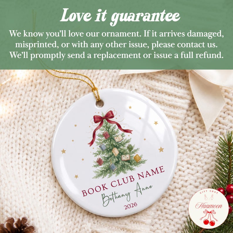 May include: A round white ceramic ornament featuring a green Christmas tree decorated with small books and a red ribbon bow at the top. The text reads BOOK CLUB NAME, Bethany Anne, and 2026. It includes a gold hanging string and gold star accents.