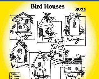 May include: Iron-on transfer sheet with seven designs of birdhouses. Each design features a birdhouse with a bird perched on top. The sheet is labeled "Bird Houses" and "3922". The sheet is also labeled "Giant 18x24 sheet of designs".